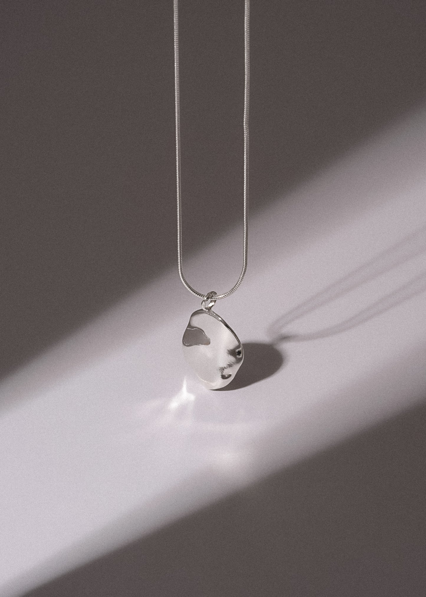 REFLECTION NECKLACE
