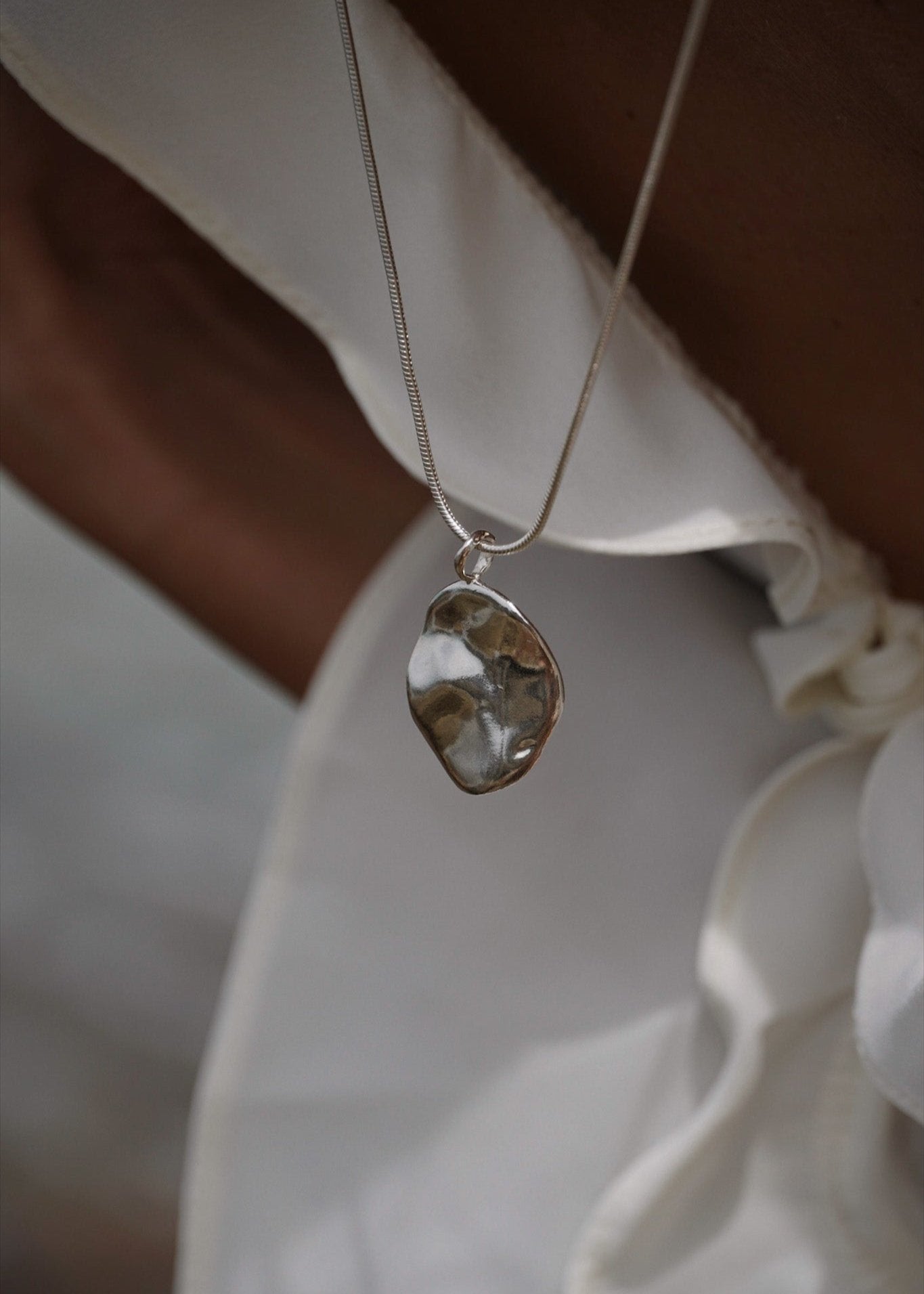 REFLECTION NECKLACE
