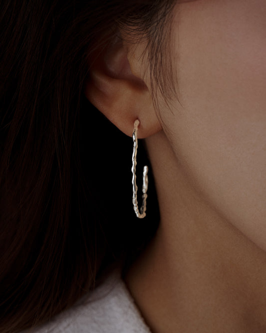 SOLAR HOOP EARRINGS