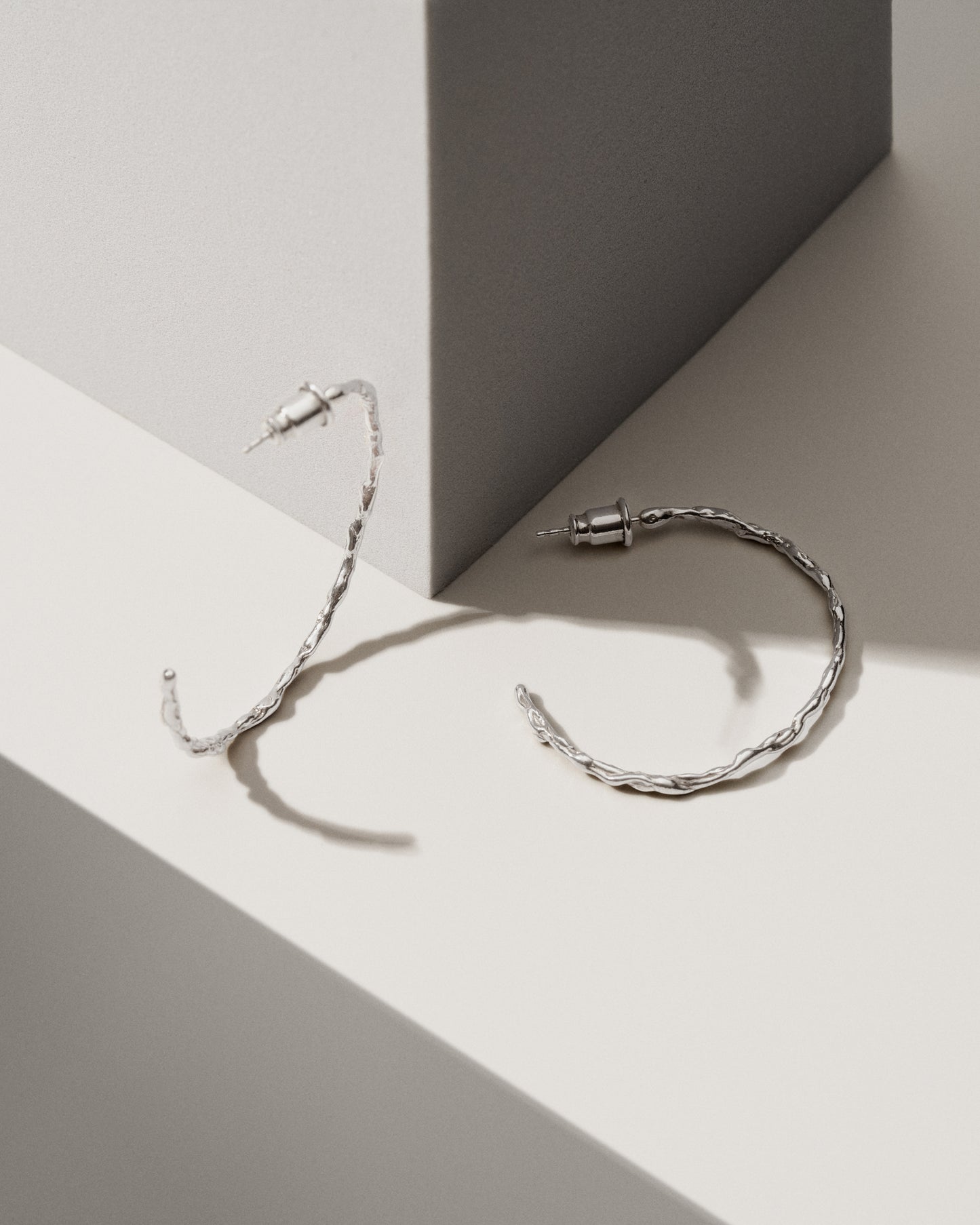 SOLAR HOOP EARRINGS