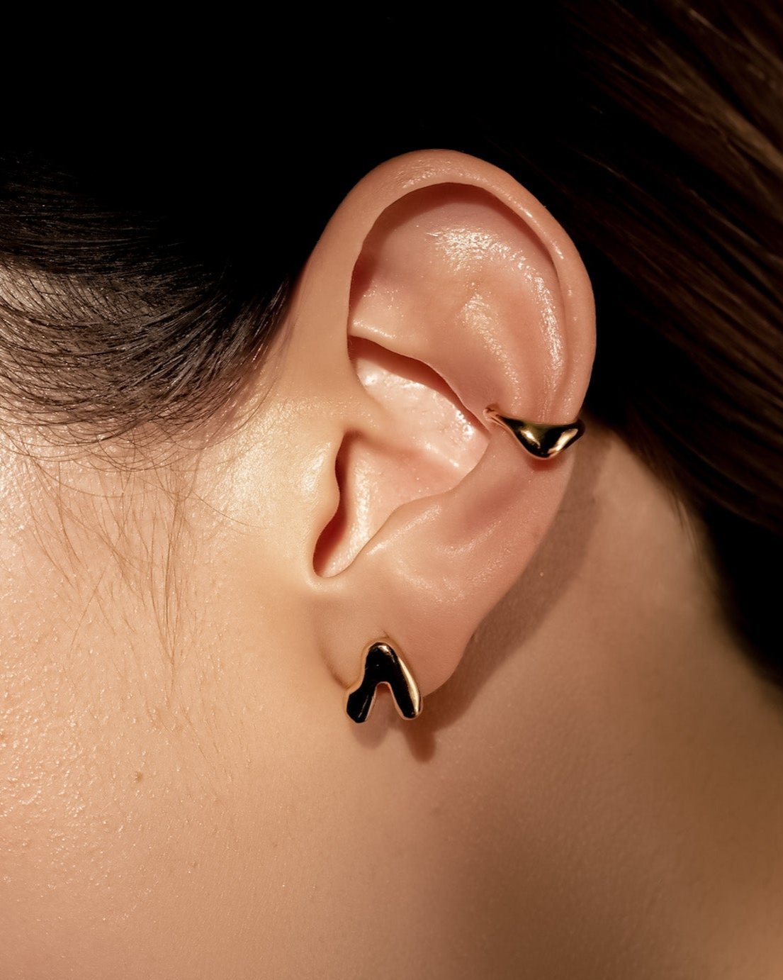 Kharys jewelry organic shaped flow stud earrings in 18k gold vermeil.