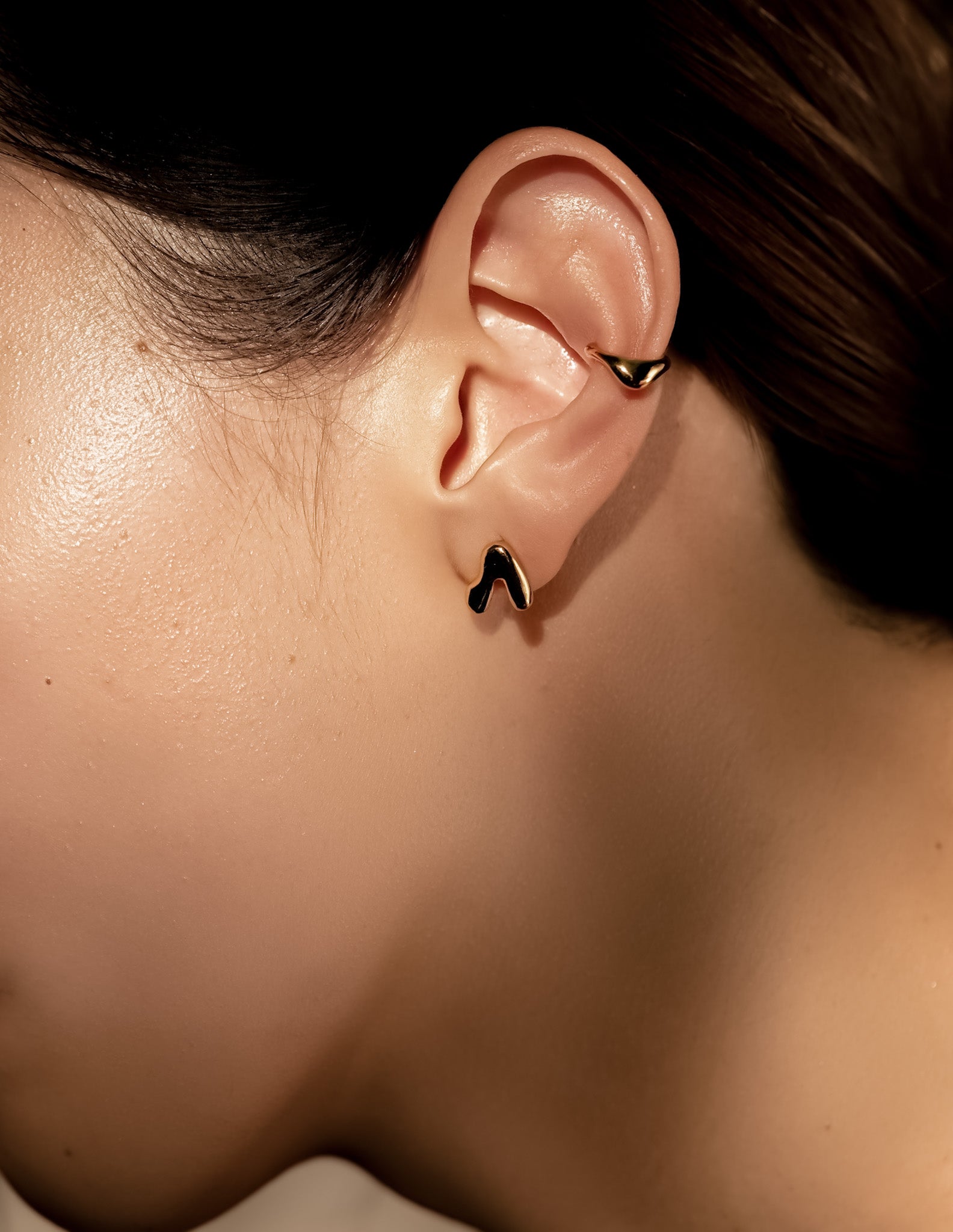 Kharys jewelry organic shaped flow stud earrings in 18k gold vermeil.