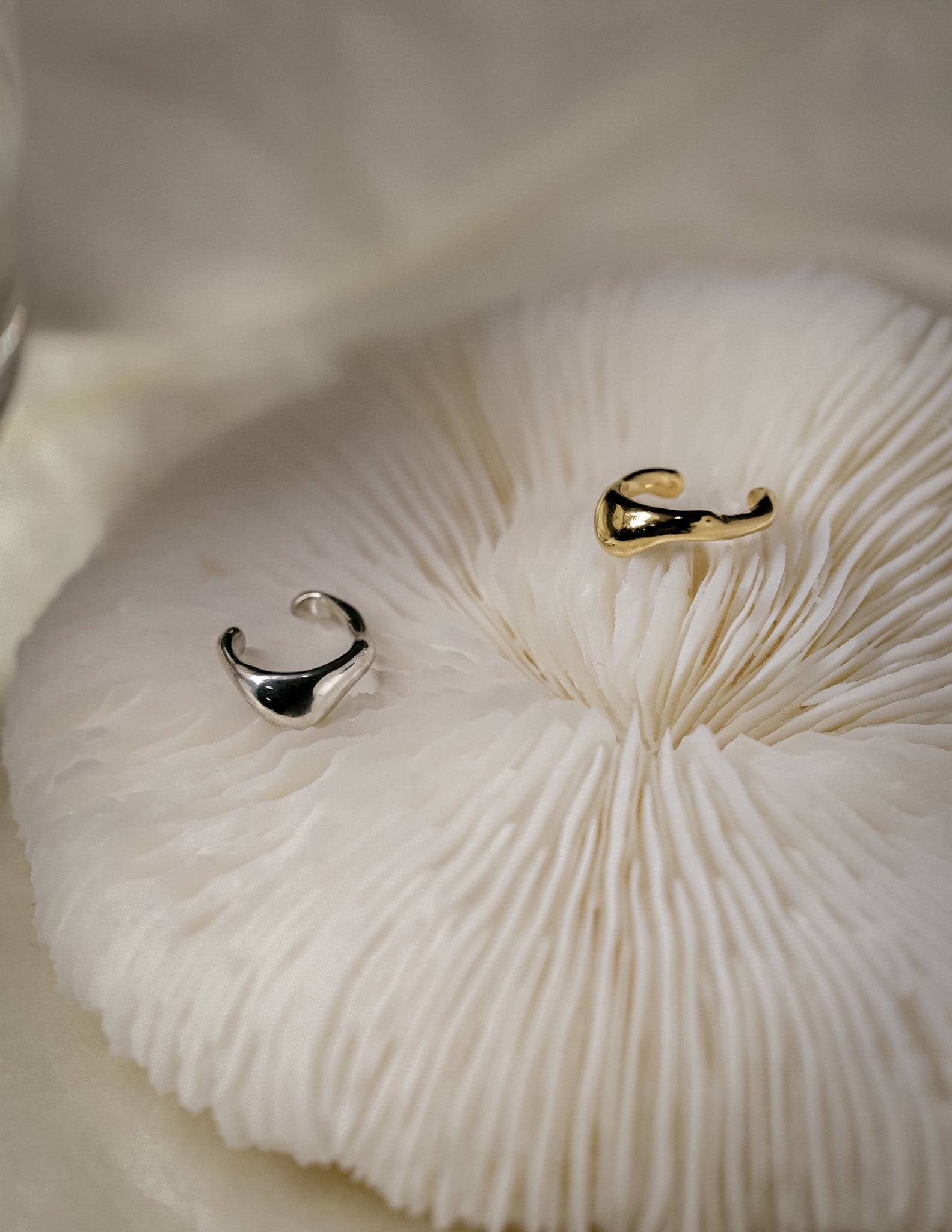 Kharys jewelry organic shaped drip ear cuff in 925 sterling silver and 18k gold vermeil